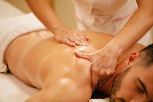 Free-Photo-_-Closeup-of-man-having-back-massage-during-spa-treatment-at-wellness-center-Copy
